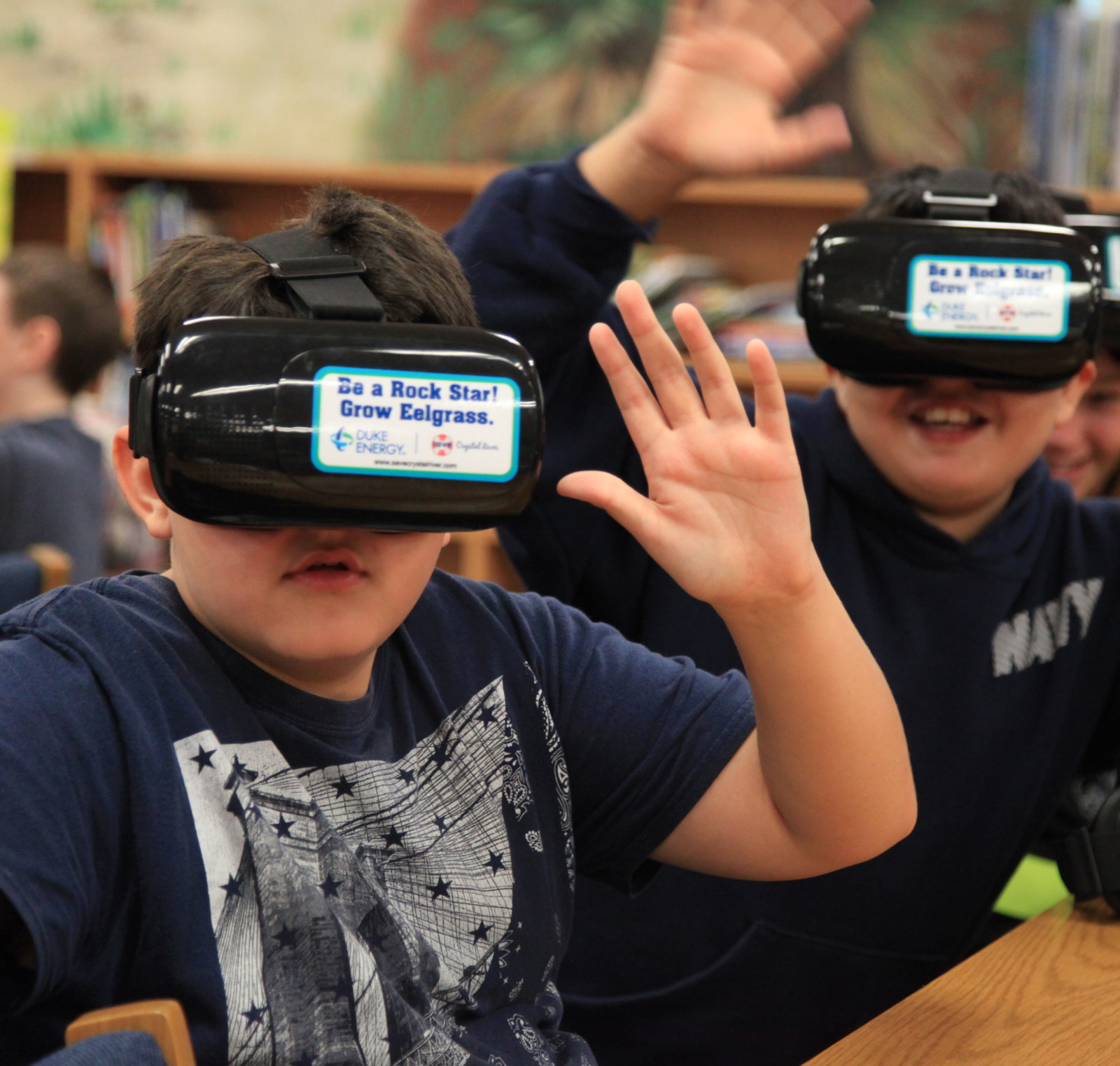 Students using Virtual Reality Goggles with Iphone
